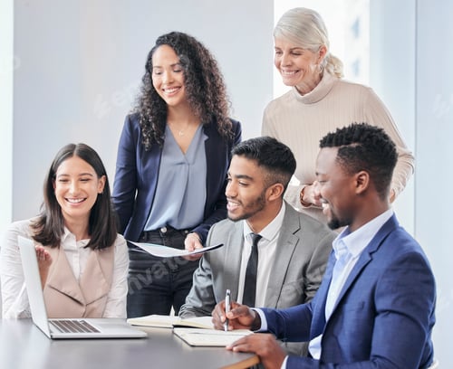 Preview: Your hard work has paid off. Shot of a group of businessepople using a laptop during a meeting.