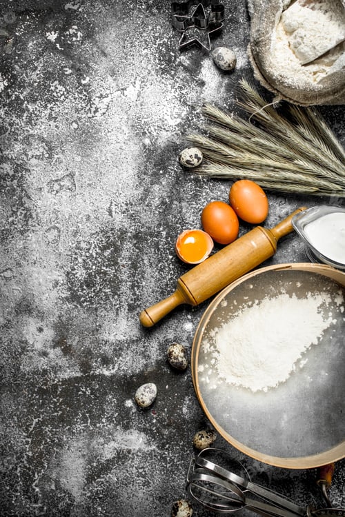 Preview: Baking background. Ingredients and tools for dough preparation.