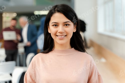 Preview: Portrait of beautiful young Asian businesswoman wearing casual clothes looking at camera