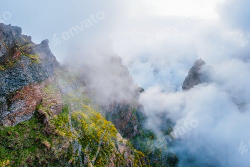 Preview: A mountain covered in fog and clouds. Madeira island, Portugal