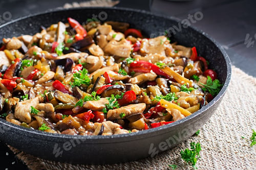 Preview: Stir fry with chicken, eggplant, zucchini and sweet peppers - Chinese food.