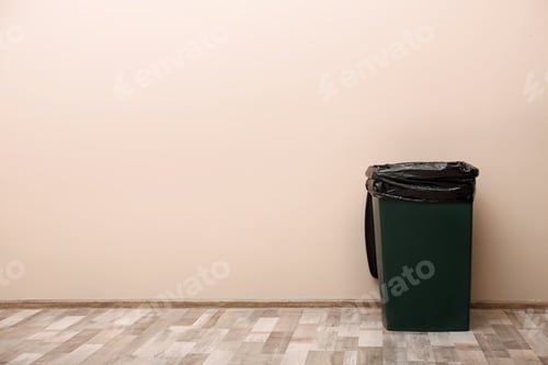 Preview: Trash bin near color wall indoors, space for text. Waste recycling