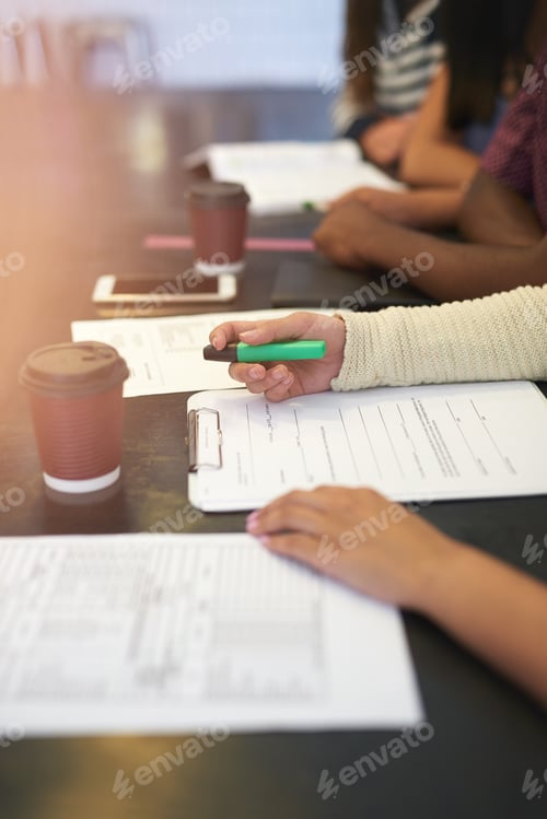 Preview: Shot of a group of unidentifiable students having a study session in a cafe