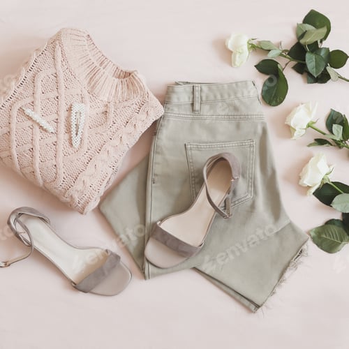 Preview: Women jeans, shoes and flowers top view. Women's stylish spring summer outfit. Trendy clothes. Flat