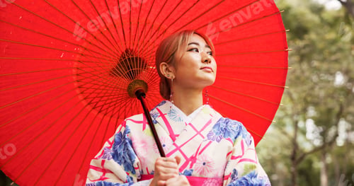 Preview: Park, umbrella and Japanese woman with kimono, thinking and urban travel with idea. Street, fashion
