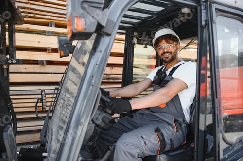 Preview: Smiling arab warehouse worker driving forklift in lumberyard