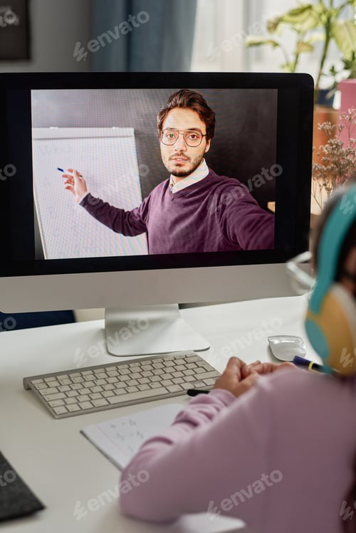 Preview: Child Learning Online with Teacher on Computer