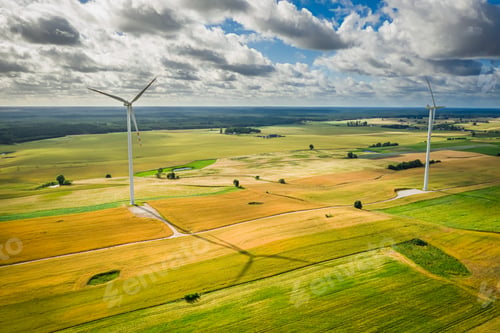 Preview: Wind turbines on field in summer, aerial view of Poland