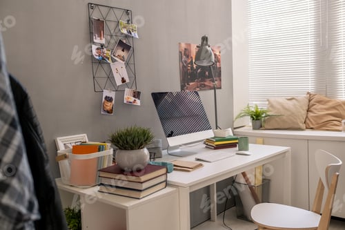 Preview: Interior of part of domestic room with desk, chair, computer and other stuff