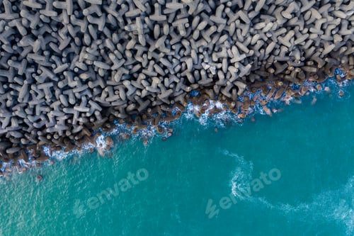Preview: Top down view of the wave breaker over the sea