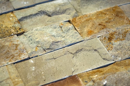Preview: Closeup detail of limestone tiled wall of floor