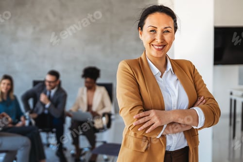 Preview: Professional in office environment, highlighting teamwork, collaboration, leadership, and innovation