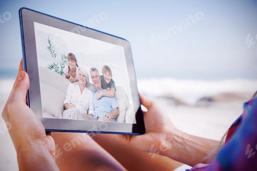 Preview: Composite Image Of Grandchildren And Grandparents Sitting On Couch