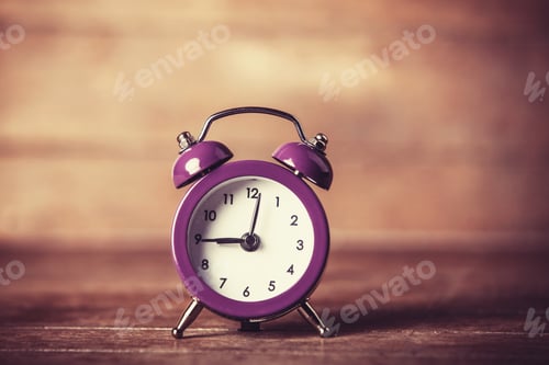 Preview: Retro alarm clock on a table