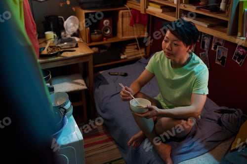 Preview: Girl eating Chinese food with chopsticks