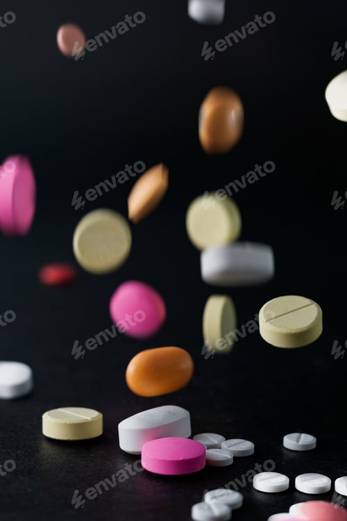 Preview: Shot of different pills on a black surface