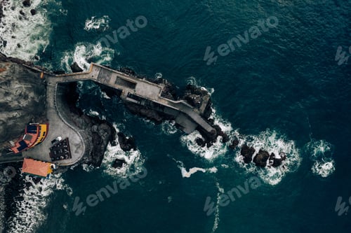 Preview: Rocky coast near blue sea