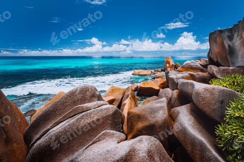 Preview: Beautifully shaped granite boulders on Grand Anse beach, La Digue island, Seychelles