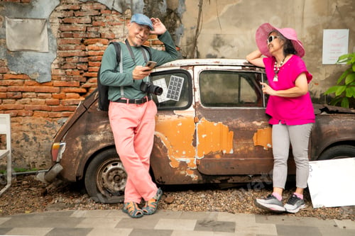 Preview: A happy senior couple strolling along a city's old neighborhood, enjoying travel