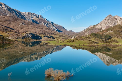 Preview: Picturesque reservoir and mountain landscape in Riano. Mirror effect. Spain