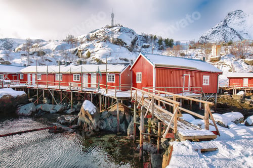 Preview: Stunning morning seascape of Norwegian sea and cityscape of Nusfjord village.