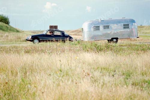 Preview: A car pulling a caravan view