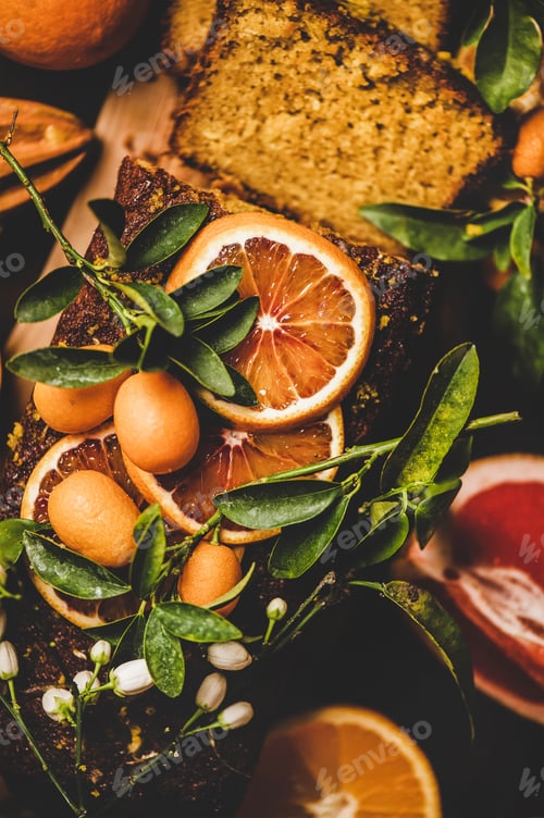 Preview: Citrus Mediterranean loaf cake with fresh fruits and blooming flowers