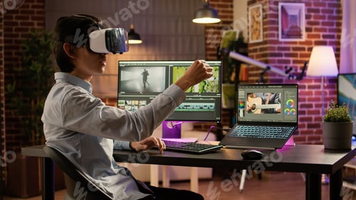 Preview: Videographer using vr glasses and editing software on pc
