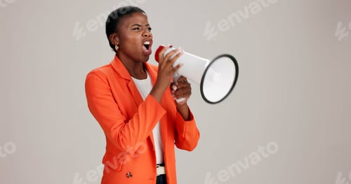 Preview: Black woman, angry and megaphone in studio for announcement, opinion and protest. Person, frustrate
