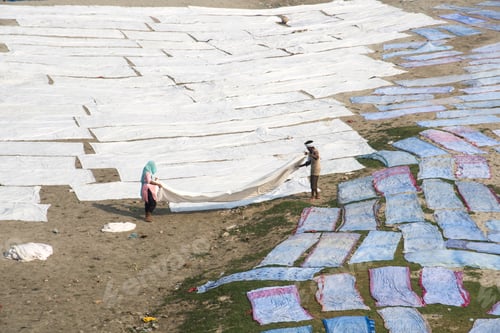 Preview: Drying cloth on banks of River Yanuma, Agra, India.