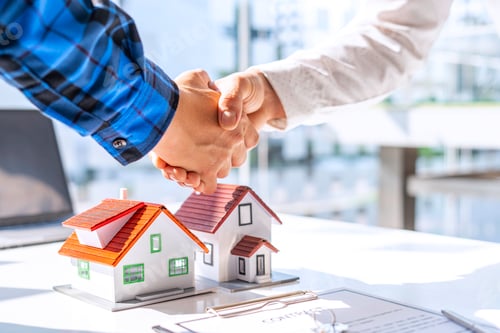 Preview: Real estate agents and clients shake hands and deliver the keys. After signing the contract to purch