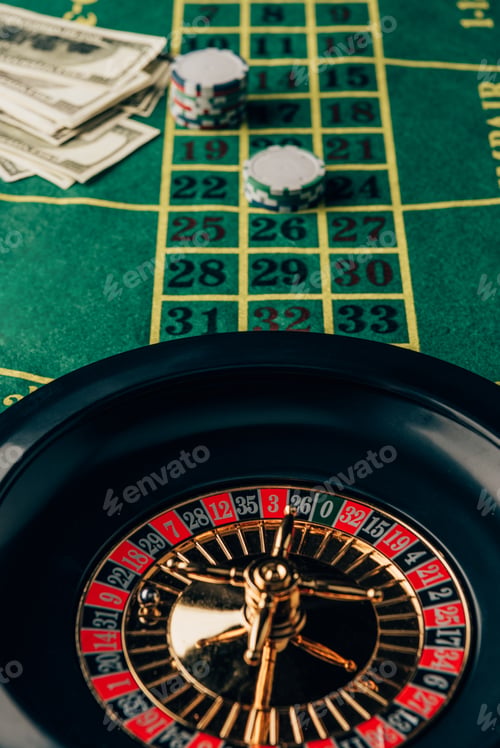 Preview: Casino table with roulette and placed chips