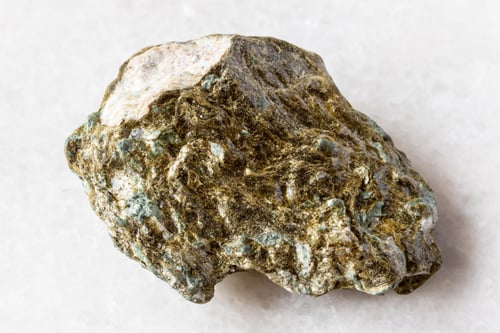 Preview: sample of raw lobanovite mineral on white marble