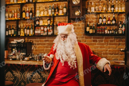Preview: Santa claus taking break at bar feeling tired