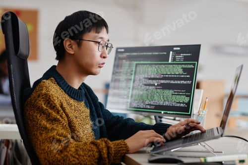 Preview: Focused Software Developer Working on Coding Projects