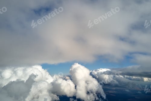 Preview: Aerial view from airplane window at high altitude of earth