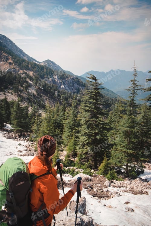Preview: Traveler shot from back on a Lycian trail taking look at Turkish nature