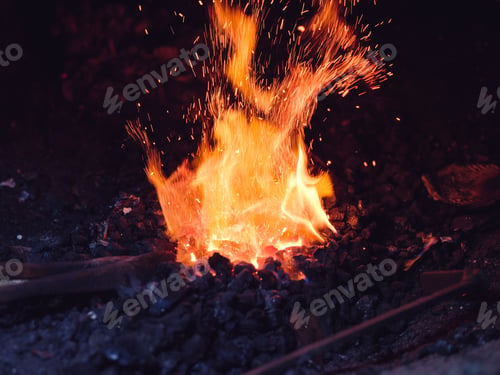 Preview: Metal being heated in furnace in workshop