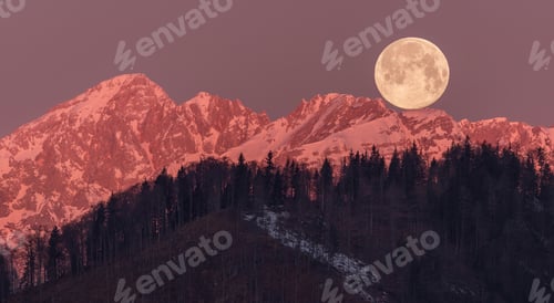 Preview: mountain silhouettes in snowy conditions