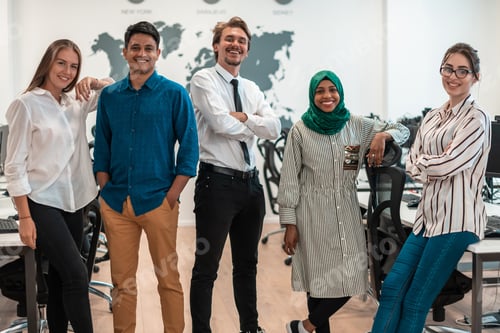 Preview: Portrait of young excited multiethnics business team of software developers standing and looking at