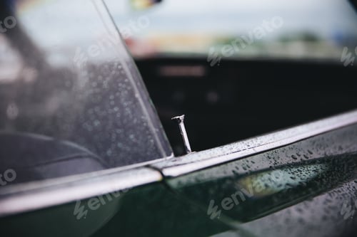 Preview: Closeup shot of a muscle car door on a blurred background