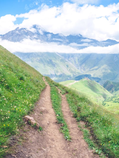 Preview: mountain road and ancient church in majestic mountains, Georgia