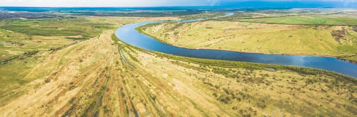 Preview: Rechytsa, Gomel Region, Belarus. Aerial View Of Dnieper River. Sky Above Green Meadow And River