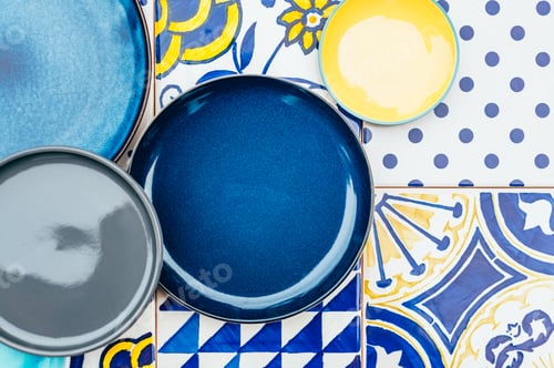 Preview: Plates on tile background