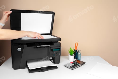 Preview: Woman using the printer to scanning and printing document
