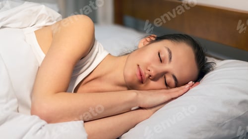 Preview: Woman Sleeping In Bed At Night