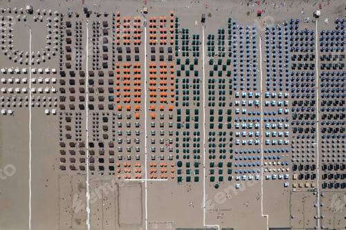 Preview: Viareggio colorful umbrellas on the seashore seen from above on a summer day
