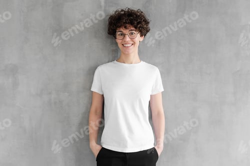 Preview: Mock up of young woman body in empty white t-shirt