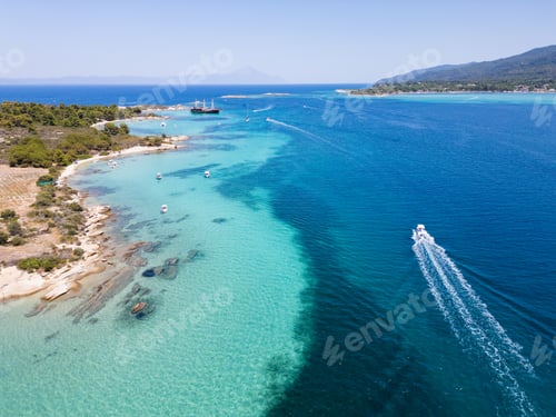 Preview: Aerial view of an island on Sithonia Peninsula, Greece, with beaches and rocks, surrounded by