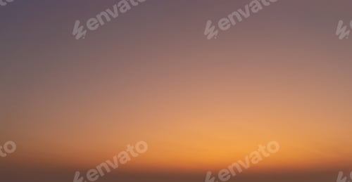 Preview: Sunset sky. Abstract nature background. Dramatic blue and orange, colorful clouds at twilight time.